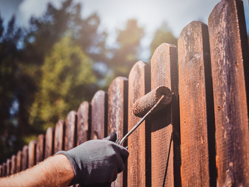 Fence staining services in Katy, Texas.