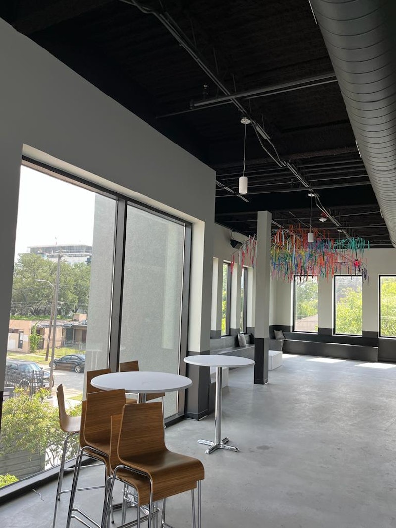 Remodeled office space with a large conference room and a modern design